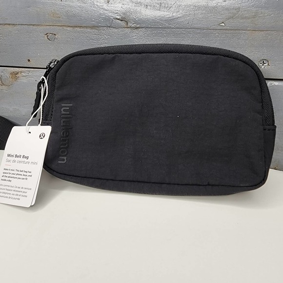 lululemon athletica Handbags - Lululemon Black Mini Belt Bag New with Tags LU9AX1S